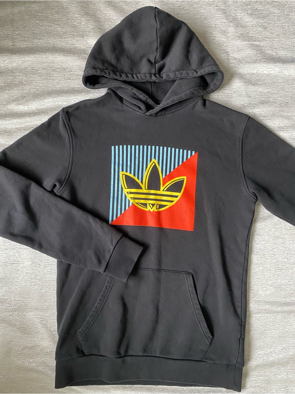 Adidas Black Pullover Hoodie with Yellow Trefoil and Red/Blue Graphic